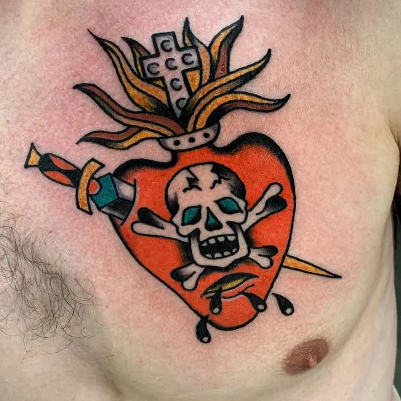 a heart with knife tattoo