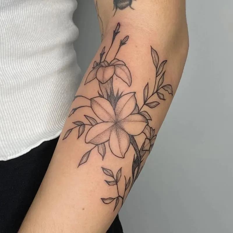 a floral tattoo on a person's arm