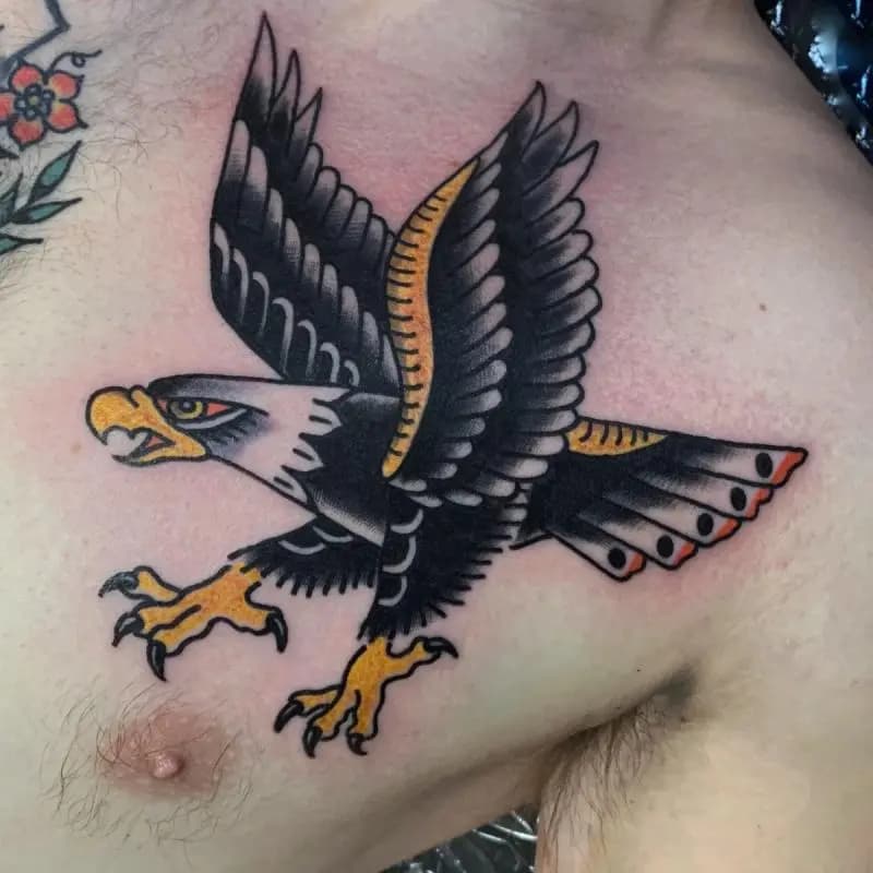 an eagle tattoo on the cheast