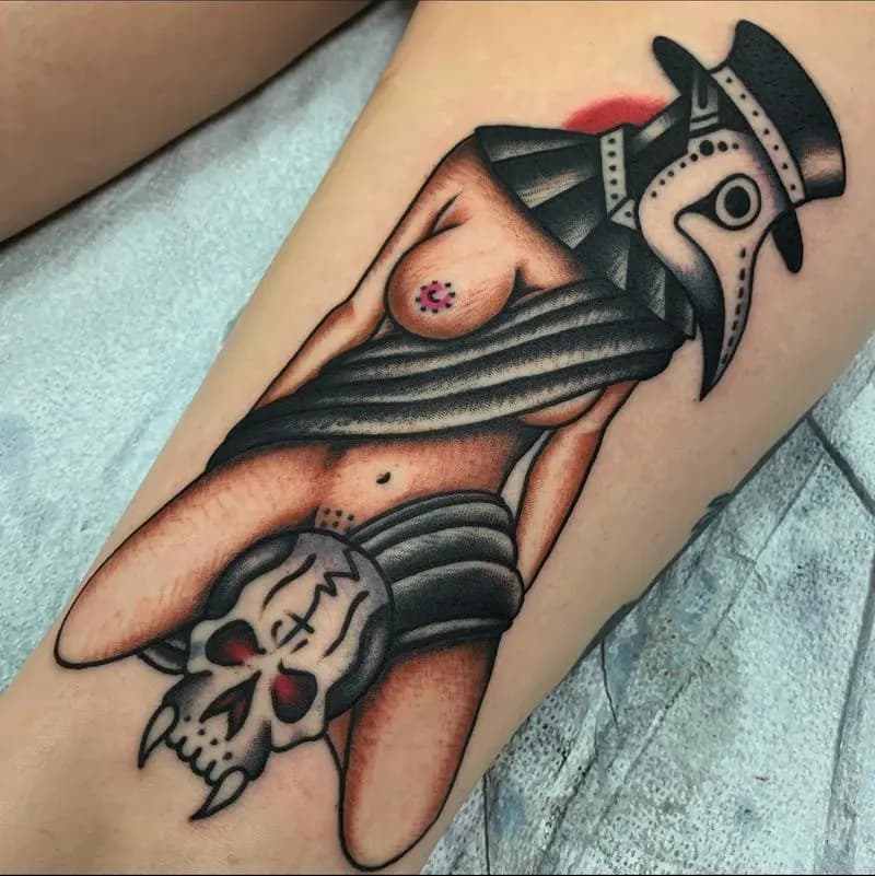 a tattoo of a person with a skull 